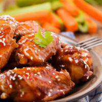The Hot Honey Wings · Pub-style hot honey wings with our double fry method.