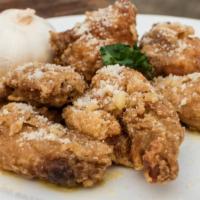 Garlic Parm Wings · Golden, crispy, deep-fried wings, glazed with garlicky and cheesy sauce. Add on a dipping sa...