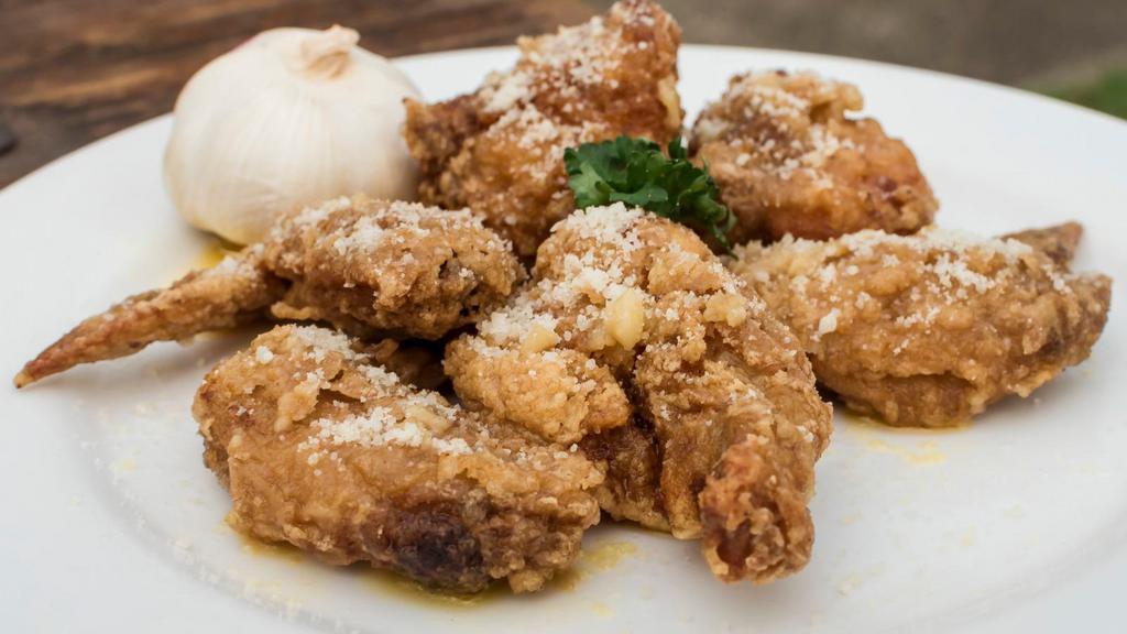Garlic Parmesan Wings · Pub-style Garlic Parmesan wings with our double fry method.