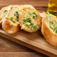 Garlic Bread · Fresh oven-baked garlic bread.