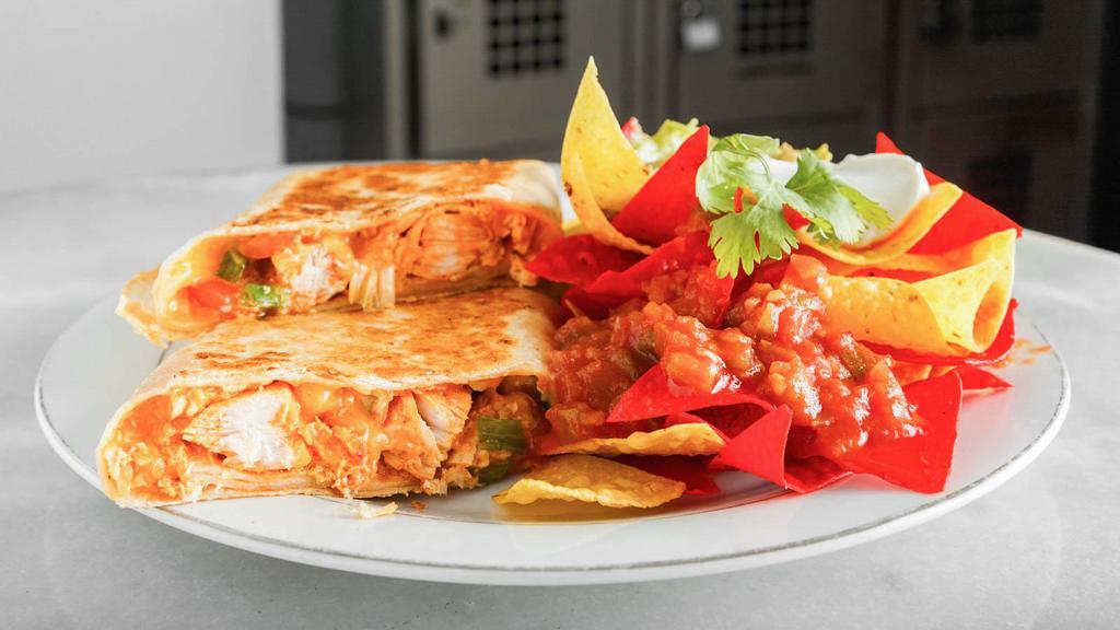 Grilled Chicken Quesadilla · Popular. Filled with pico de gallo, melted mixed cheese. Served with salsa and sour cream on the side.