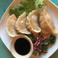 Vegetable Dumplings (4) · Cabbage, Carrot, Mushroom, Turnip filling.  Select Fried or Steamed