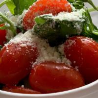 Baby Arugula · With grape tomatoes, Grana Padana, and house vinaigrette