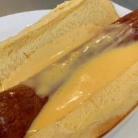 Cheese Dog · Our classic grilled dog with house made cheese sauce.