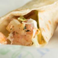 Shrimp Taco · Served with fresh lettuce, tomato, cheddar cheese, and sour cream.