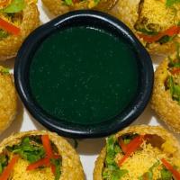 Hyderabadi Gol Gappe · Hot garbanzo stuffing, cilantro and mint panni, house spice.