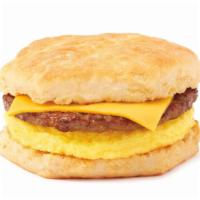 Biscuit Breakfast Sandwich · Seasoned egg omelet, your choice of sausage patty or bacon, and sliced cheddar cheese on a w...
