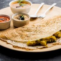 Onion Dosa · A fresh made thin Indian crepe made from a fermented batter of lentils and rice, topped with...