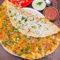 Paneer Dosa · A fresh made thin Indian crepe made from a fermented batter of lentils and rice stuffed with...