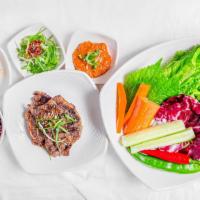 Ssam Bap Set · Lettuce wrap set. Served with assorted veggies, soybean paste, roasted garlic and scallion s...