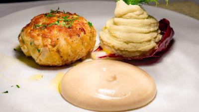 Crab Cake · Made with the freshest crabmeat from Maryland's blue crabs and served with Santorini piazzi-style beans