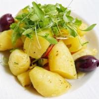 Fingerling Potatoes · Steamed with mint, dill, cilantro, and extra virgin olive oil