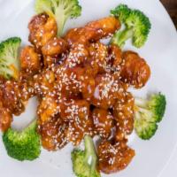 Sesame Chicken · Served with steamed rice.