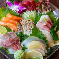 Sashimi Deluxe · 18 pieces of assorted raw fish.