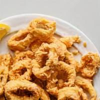 Calamari Fritti · Fried golden crisp with hot cherry peppers tossed with balsamic glaze.