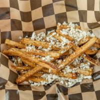 Greek Fries · Homemade fries topped with feta cheese and oregano.