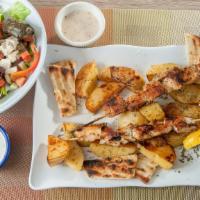 Chicken Souvlaki Platter · Served with salad, pita, tzatziki or tahini sauce and choice of lemon potatoes, rice, or fre...