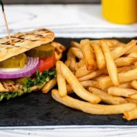 Grilled Chicken Sandwich Meal · Served with 1 Side, lettuce, tomato, onions, pickles on a Pita with our house-made Honey Mus...