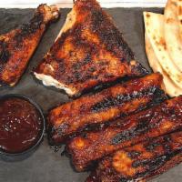 1/4 Chicken + 3Pc Ribs  · 1/4 Chicken Dark & 3 Pieces of BBQ St. Louis Ribs. Served with pita bread and house-made sau...