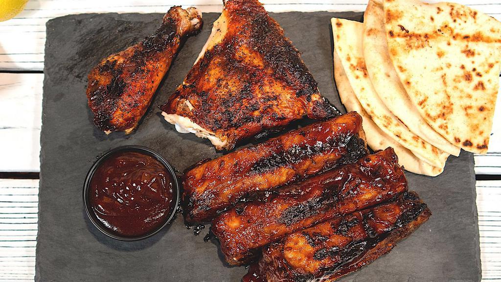 1/4 Chicken + 3Pc Ribs  · 1/4 Chicken Dark & 3 Pieces of BBQ St. Louis Ribs. Served with pita bread and house-made sauce.