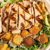 Caesar Salad · Romaine lettuce, parmesan cheese & croutons & Creamy Caesar dressing on the side.
