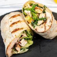 Chicken Caesar Wrap  · Grilled chicken breast, fresh romaine, parmesan cheese, croutons & caesar dressing in a fres...