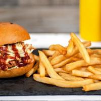 Bbq Pulled Chicken Burger  · Flame-grilled shredded chicken glazed in BBQ sauce & house-made coleslaw on a toasted bun.