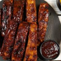 8Pc Ribs Meal  · 8 pieces of flame-grilled BBQ St. Louis Ribs served with 2 regular sides, 1 pita bread & 2 s...