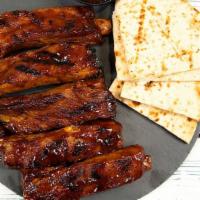5Pc Ribs  · St. Louis BBQ Ribs served with warm pita bread & house-made bbq sauce.