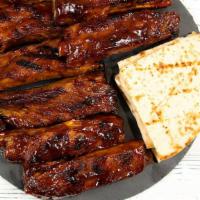 8Pc Ribs  · St. Louis BBQ Ribs served with warm pita bread & house-made bbq sauce.