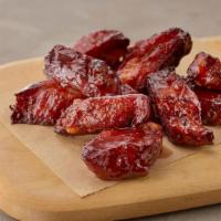 Bbq Rib Tips · Think candied ribs. Low and slow smoked spare rib tips tossed in our house bbq sauce.