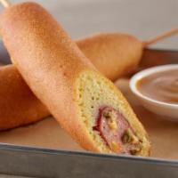 Jalapeno Cheddar Corndogs · Our jalapeno  and cheddar smoked sausage in cornmeal battered. Served with sweet and tangy m...