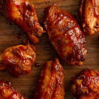 8 Jumbo Wings · Giant, juicy, rubbed, golden fried wings tossed in your choice of sauce or dry rub. Get them...