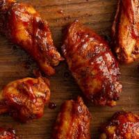 24 Jumbo Wings · Giant, juicy, rubbed, golden fried wings tossed in your choice of sauce or dry rub. Get them...