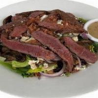 Steak Salad · Top sirloin, mixed greens, red onions, blue cheese crumbles, grilled mushrooms, bacon crumbl...