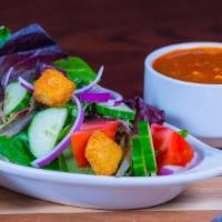 Specialty Soup & Salad · Choice of Garden Greens or Caesar side salad with our cornbread croutons, a cup of one of ou...