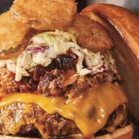 Signature Bbq Burger · House-smoked pulled pork, cheddar, coleslaw, fried pickles, Memphis Seasoning, and KC BBQ Sa...