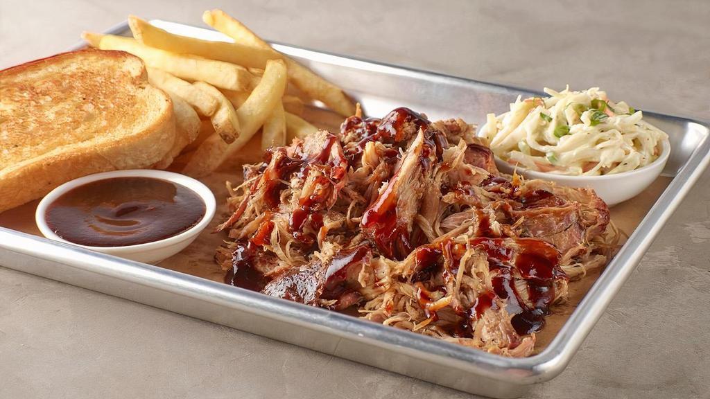 Hand Pulled Pork Platter · House-smoked for 9 hours, hand-pulled, seasoned with salt and pepper. Served with 2 regular sides.