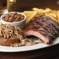 Baby Back Ribs · Award-winning baby back ribs, seasoned and hand-rubbed, house-smoked for 4 hours and flavore...