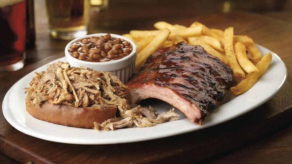 Baby Back Ribs · Award-winning baby back ribs, seasoned and hand-rubbed, house-smoked for 4 hours and flavored with a sweet and smokey BBQ sauce. Served with your choice of 2 regular sides.