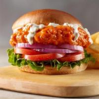 Crispy Buffalo Chicken  · Southern style breaded chicken breast, tossed in buffalo sauce, topped with chunky blue blue...