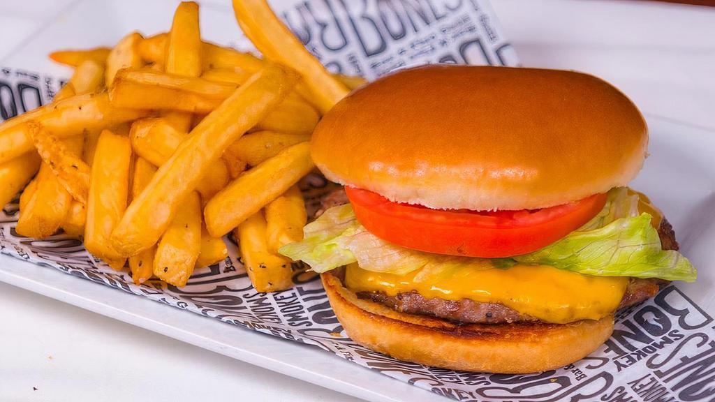 Kid'S Cheeseburger · Kid's Burger with American cheese served with your choice of 1 regular side and a beverage.