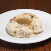Mashed Potatoes & Brown Gravy · Mashed Red Potatoes served with Brown Gravy. Upgrade to Family or Large. Family feeds 6-8 pe...