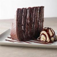 Layered Chocolate Cake · Five layers of chocolate cake, dark fudge, sweet chocolate frosting, vanilla ice cream, a ch...
