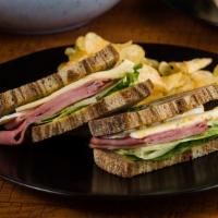 Ham And Brie Sandwich · Ham, brie, lettuce, honey msutard dijonaise, marble rye bread.