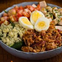 Chicken Cobb Salad · Herbed grilled chicken, bacon, blue cheese, eggs, tomato,. spinach, balsamic dressing.