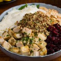 Chicken Kale And Quinoa Salad · Herbed grilled chicken, dried cranberries, shaved ricotta. salata, toasted almonds, dijon vi...