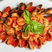 Zuppa Di Pesce · Mussels, clams, shrimp, calamari (white or red sauce).