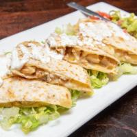 Grilled Chicken Quesadilla · Flour tortilla filled with Monterrey jack and muenster cheese mix. Served guacamole, pico de...