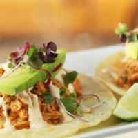 Pollo Tacos · Three soft shell tacos served with rice, beans, pico de gallo, guacamole, salsas and grilled...